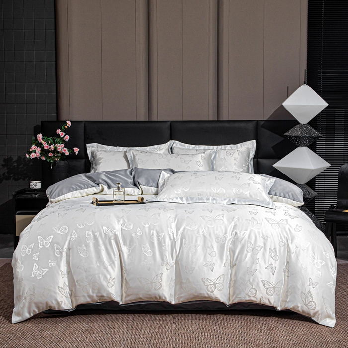 91家纺网 家纺一手货源 找家纺 畅畅家纺 2026春夏新款高档轻奢水洗真丝提花四件套夏天纯色床单床笠 蝶之恋-白拼灰