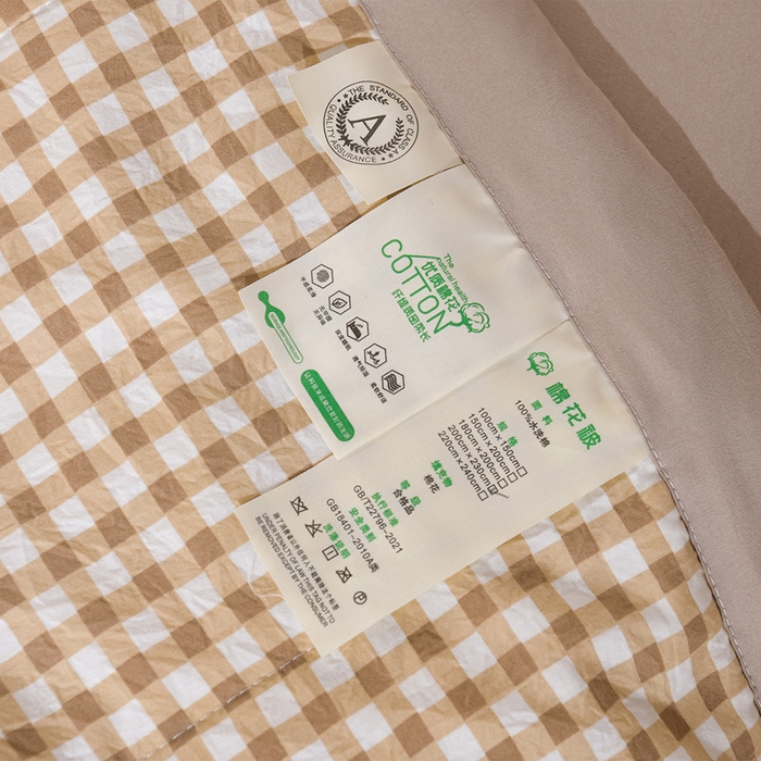 91家纺网 家纺一手货源 找家纺 欧朵家纺 2026春夏新款水洗棉新疆棉花被夏凉被空调被 浅米小格