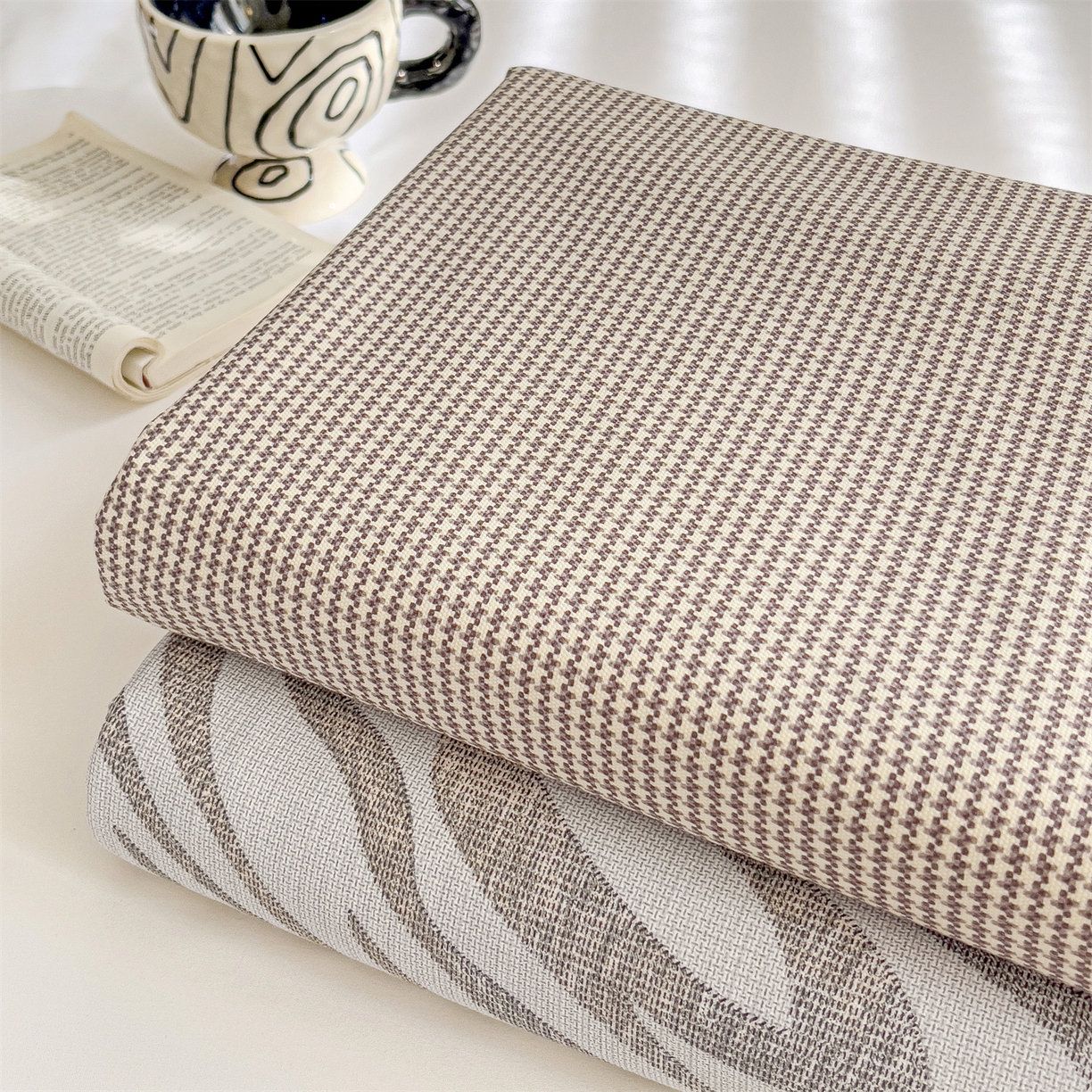 91家纺网 家纺一手货源 找家纺 名兮家居 2026新款全棉A类卡通简约时尚老粗布床单 千鸟格