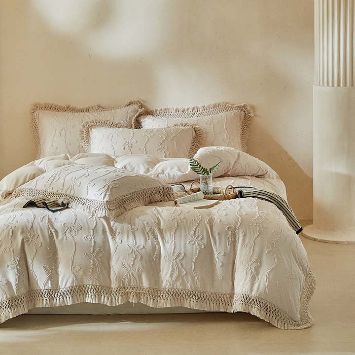 91家纺网 家纺一手货源 找家纺 缘生活 2026春夏新款民宿立体剪花蝴蝶结流苏四件套 剪花竖条纹蝴蝶结流苏卡其