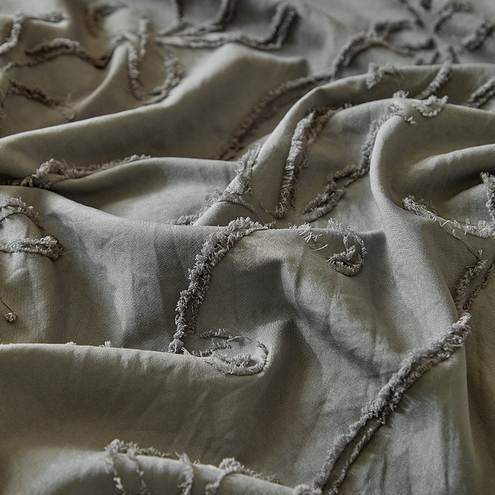 91家纺网 家纺一手货源 找家纺 缘生活 2026春夏新款民宿立体剪花蝴蝶结流苏四件套 剪花竖条纹蝴蝶结流苏深灰