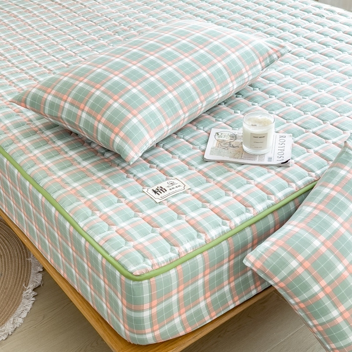 91家纺网 家纺一手货源 找家纺 蕾诺家纺 2026新款色织水洗棉棉花夹棉床笠保护套 橘绿条