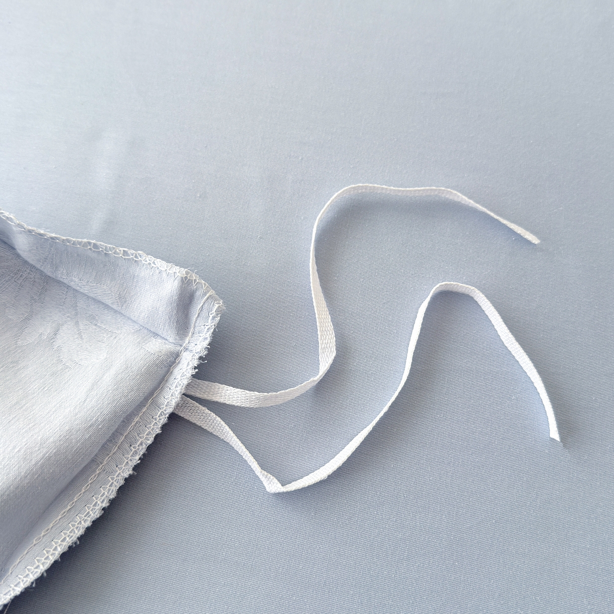 91家纺网 家纺一手货源 找家纺 慕尚家纺 2026新款A类60支长绒棉纯棉提花贡缎大提花光泽绸缎感四件套 花卉蓝