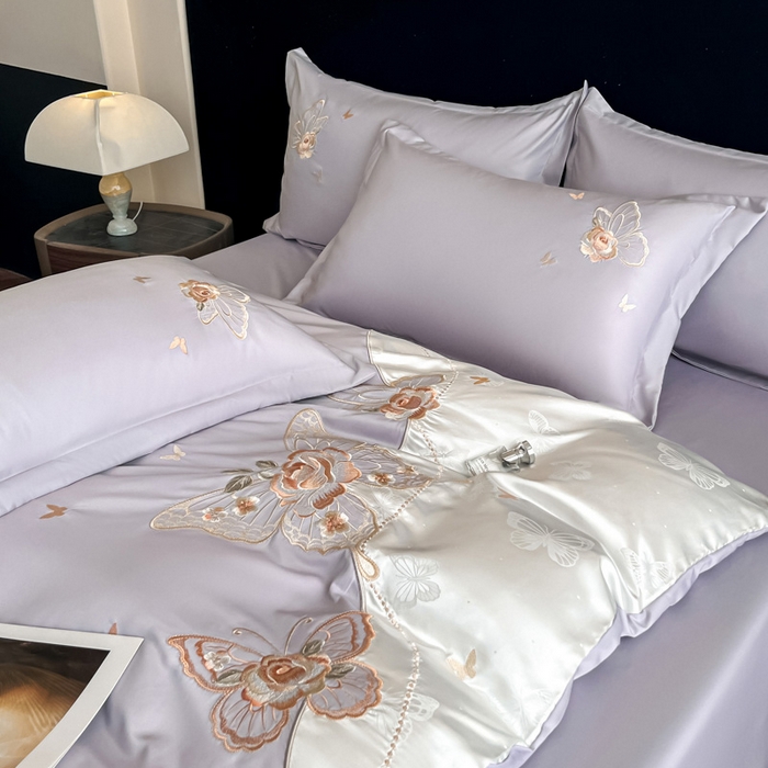 91家纺网 家纺一手货源 找家纺 金牛座家纺 2026新款细斜纹亮丝提花贴布绣重工刺绣四件套-潘妮系列 潘妮-浅紫