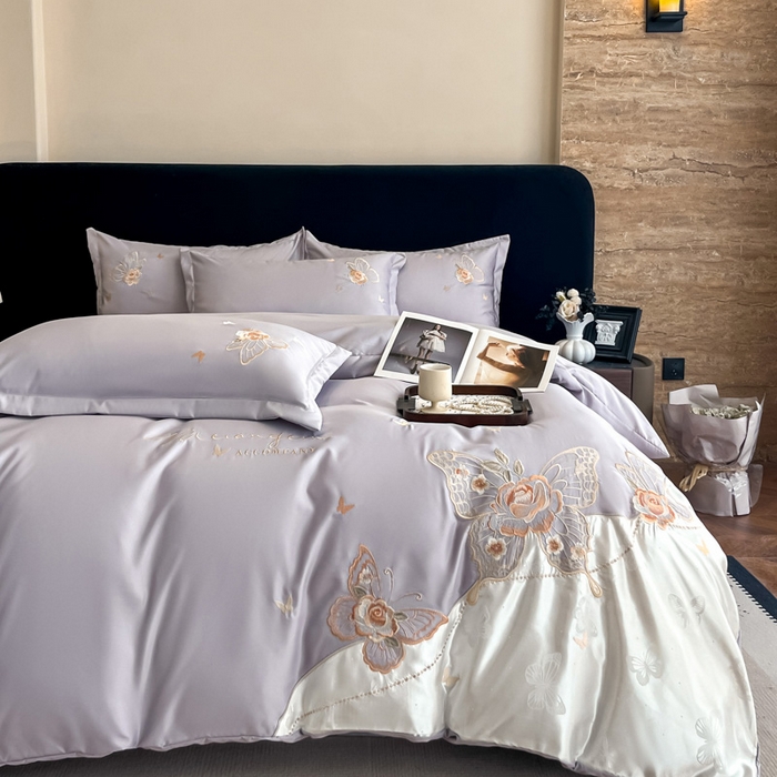 91家纺网 家纺一手货源 找家纺 金牛座家纺 2026新款细斜纹亮丝提花贴布绣重工刺绣四件套-潘妮系列 潘妮-浅紫