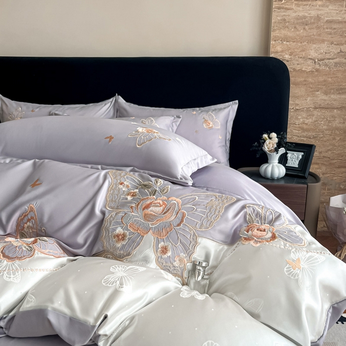 91家纺网 家纺一手货源 找家纺 金牛座家纺 2026新款细斜纹亮丝提花贴布绣重工刺绣四件套-潘妮系列 潘妮-浅紫