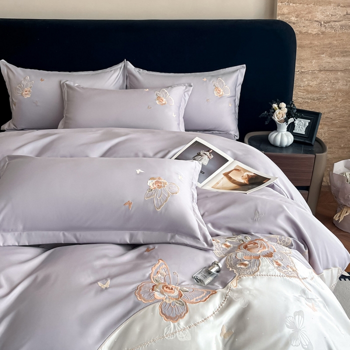 91家纺网 家纺一手货源 找家纺 金牛座家纺 2026新款细斜纹亮丝提花贴布绣重工刺绣四件套-潘妮系列 潘妮-浅紫