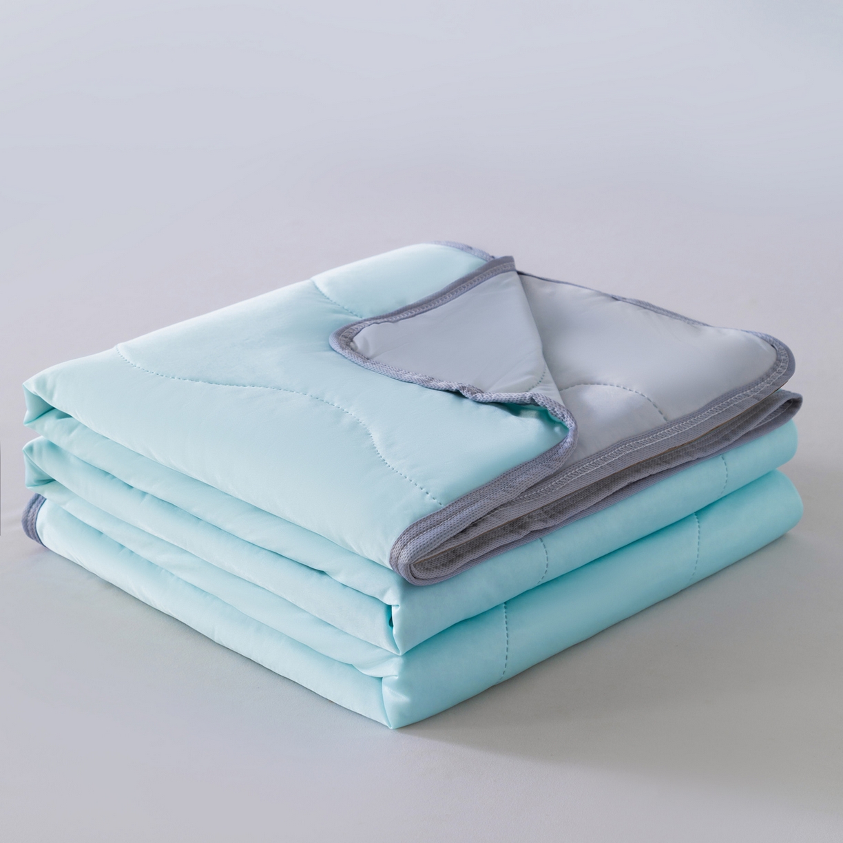 91家纺网 家纺一手货源 找家纺 畅销被业 2026新款凉感丝夏凉被夏被-大波浪 波浪格-浅绿