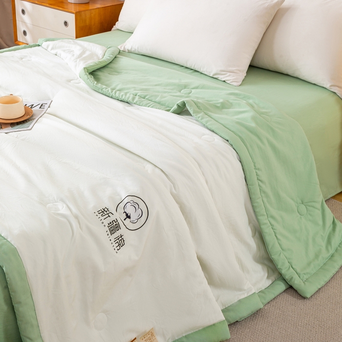 91家纺网 家纺一手货源 找家纺 憨豆家纺 2026春夏新款 水洗棉纯色双拼棉花被夏凉被空调被（常年有货款） 棉朵-果绿白