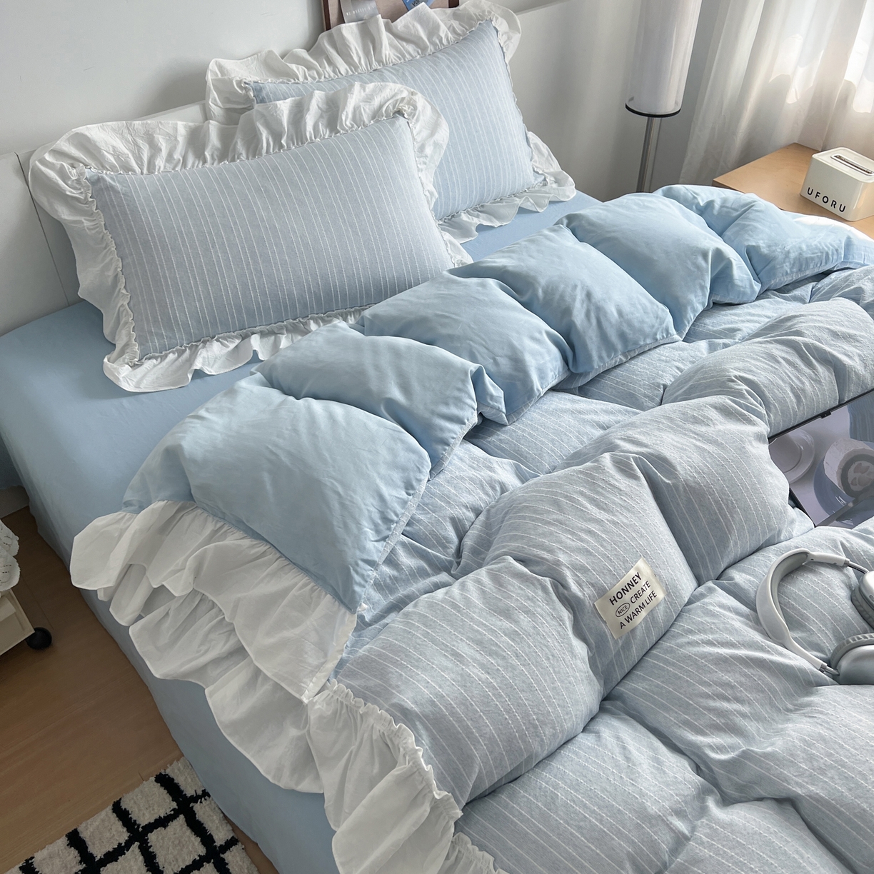 91家纺网 家纺一手货源 找家纺 晨曦家纺 2026新款荷叶花边泡芙纱提花四件套可水洗棉四件套少女风 海盐蓝