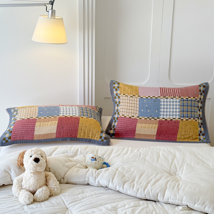 91家纺网 家纺一手货源 找家纺 乐家毛巾被（工厂自产自销） 2026新款全棉A类母婴级卡通软绵绵系列枕巾隔汗巾 复古拼布格