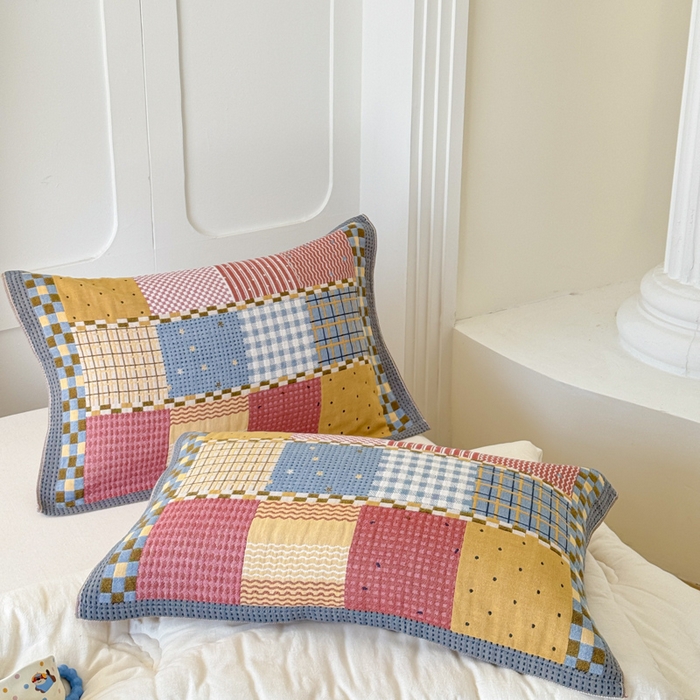 91家纺网 家纺一手货源 找家纺 乐家毛巾被（工厂自产自销） 2026新款全棉A类母婴级卡通软绵绵系列枕巾隔汗巾 复古拼布格