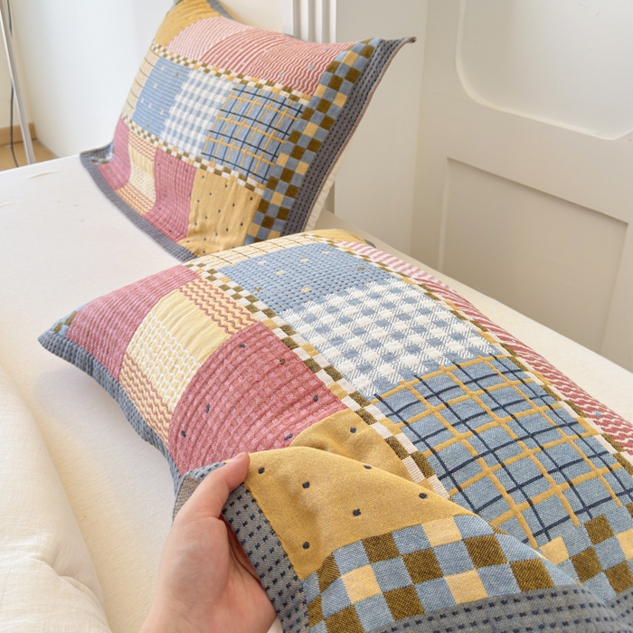 91家纺网 家纺一手货源 找家纺 乐家毛巾被（工厂自产自销） 2026新款全棉A类母婴级卡通软绵绵系列枕巾隔汗巾 复古拼布格