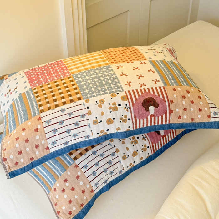 91家纺网 家纺一手货源 找家纺 乐家毛巾被（工厂自产自销） 2026新款全棉A类母婴级卡通软绵绵系列枕巾隔汗巾 拼格蛋糕