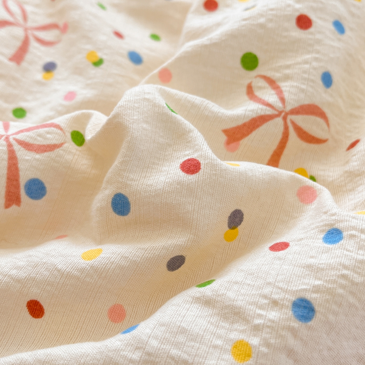 91家纺网 家纺一手货源 找家纺 优承佳生活馆 2026新款云感双层纱卡通小清新风格棉花夏被（提供买家秀） 蝴蝶结波点