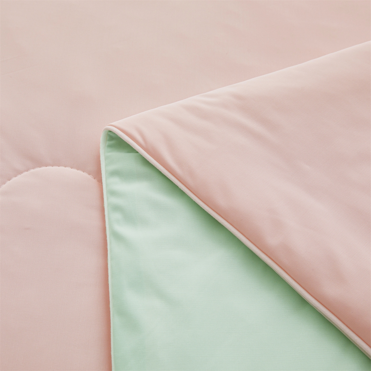 91家纺网 家纺一手货源 找家纺 小禹仔家纺 2026新款氨纶凉感印花夏被 冰感粉拼薄荷绿