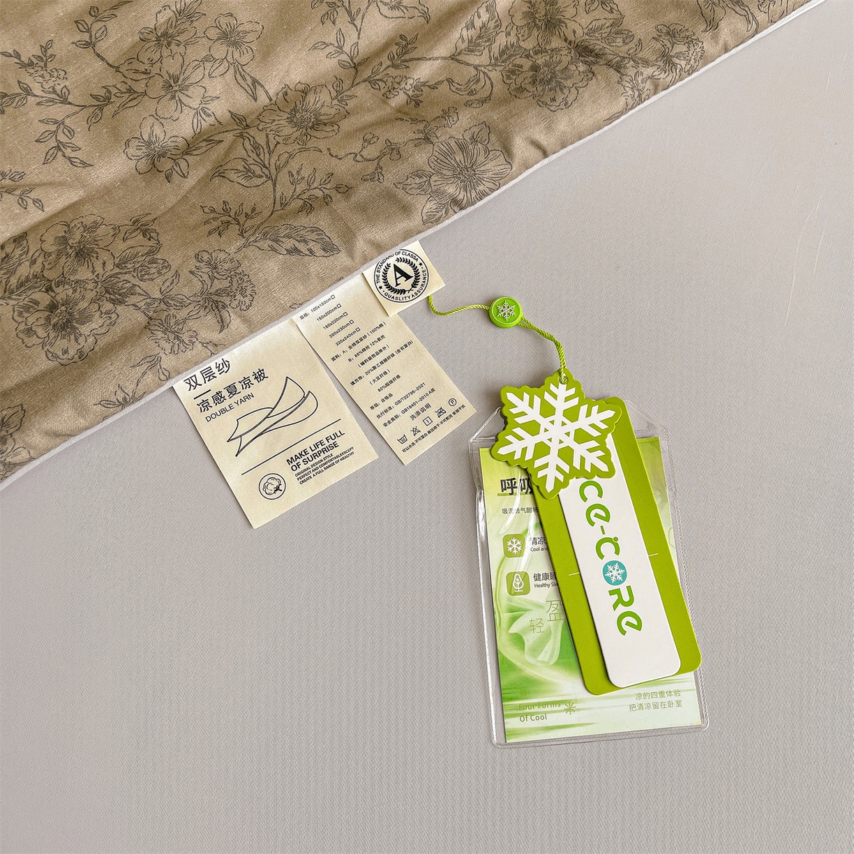 91家纺网 家纺一手货源 找家纺 小禹仔家纺 2026新款A类印花双层纱凉感大豆夏被 素描山樱-咖