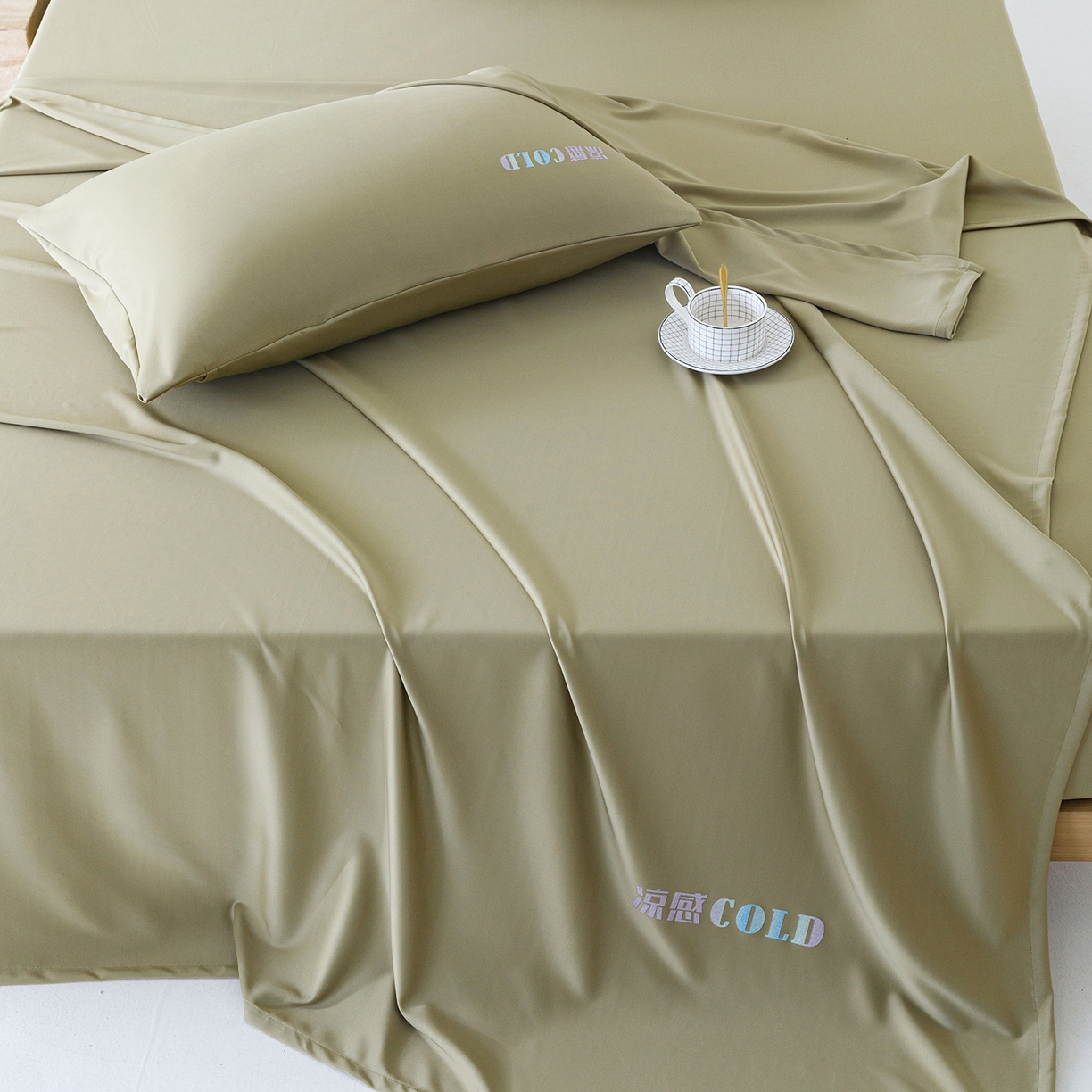 91家纺网 家纺一手货源 找家纺 悦然毛巾被 2026新款锦氨冷感毯300克加厚盖毯床笠夏被空调凉感夏凉被空调被 素凉清感豆绿