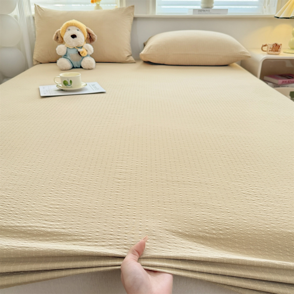 91家纺网 家纺一手货源 找家纺 女子家纺 2026新款亲肤泡芙纱印花床笠单床笠床笠单件 米杏色