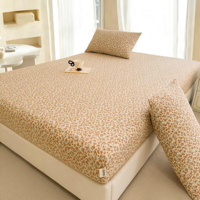 91家纺网 家纺一手货源 找家纺 几禾 2026新款高克重泡芙纱~印花款（单床笠）浅糯系列-110g CL浅糯-暖橘枝