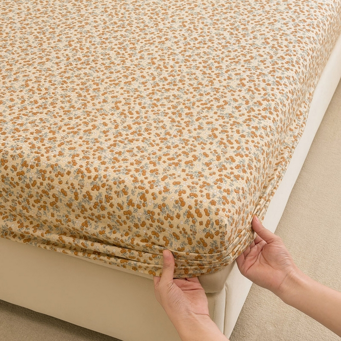 91家纺网 家纺一手货源 找家纺 几禾 2026新款高克重泡芙纱~印花款（单床笠）浅糯系列-110g CL浅糯-暖橘枝