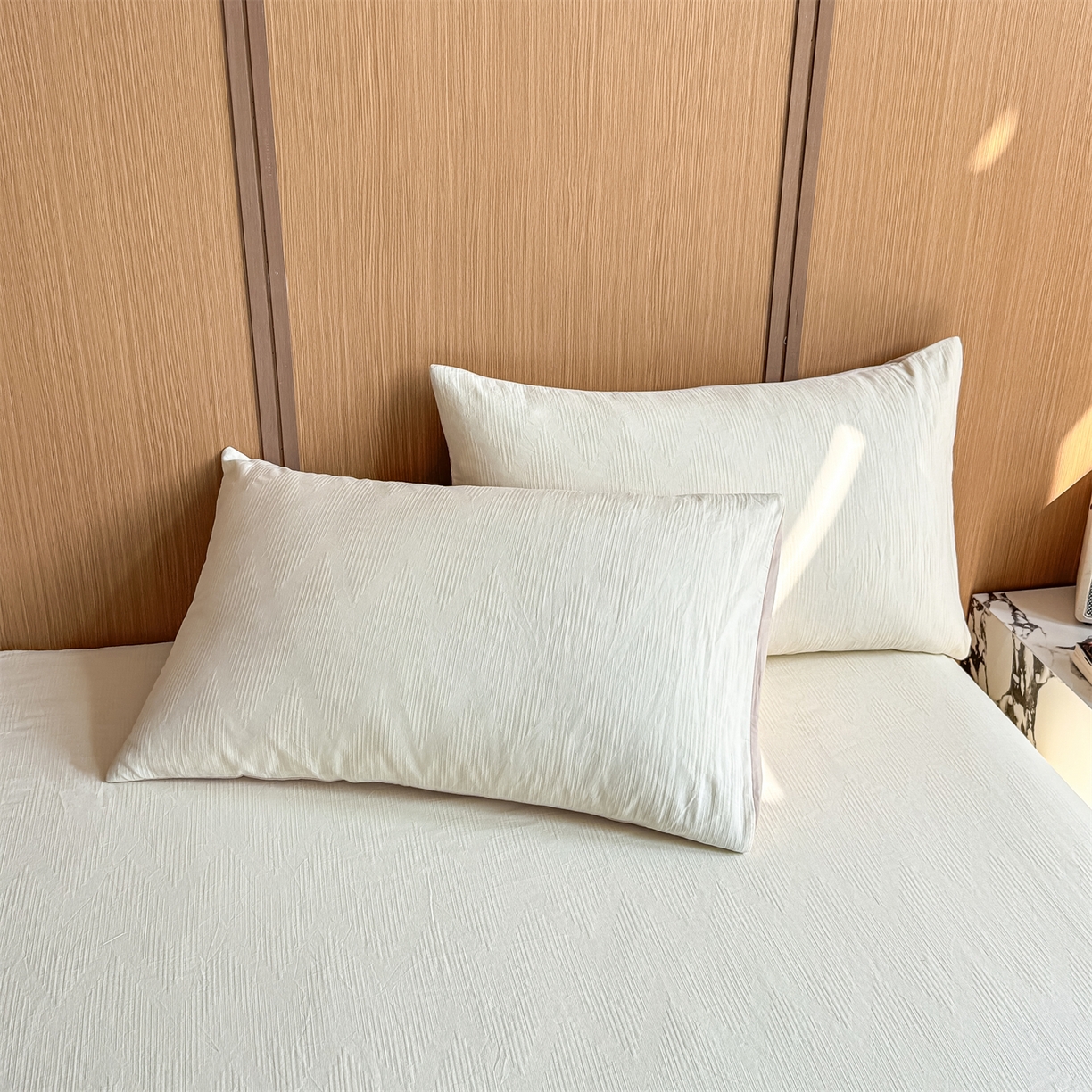 91家纺网 家纺一手货源 找家纺 灰鲸 2026新款全棉简约三层纱色织提花单品床单 影韵-杏仁奶霜