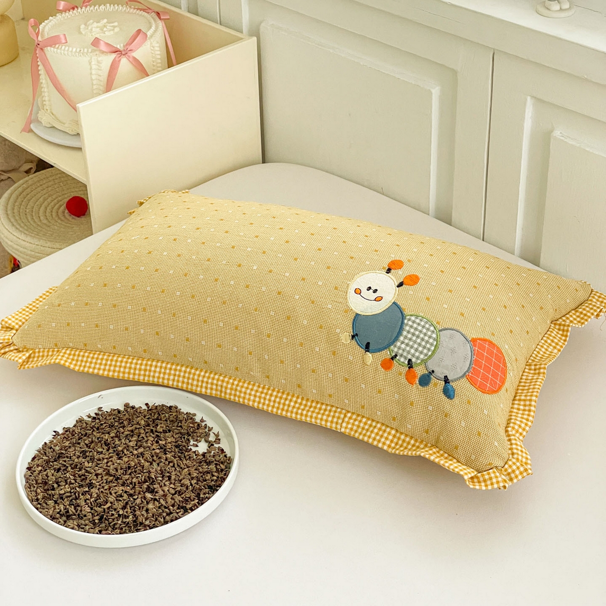 91家纺网 家纺一手货源 找家纺 梦叶草 2026新款全棉色织荞麦枕糖果虫荞麦枕枕头枕芯 糖果虫-米黄