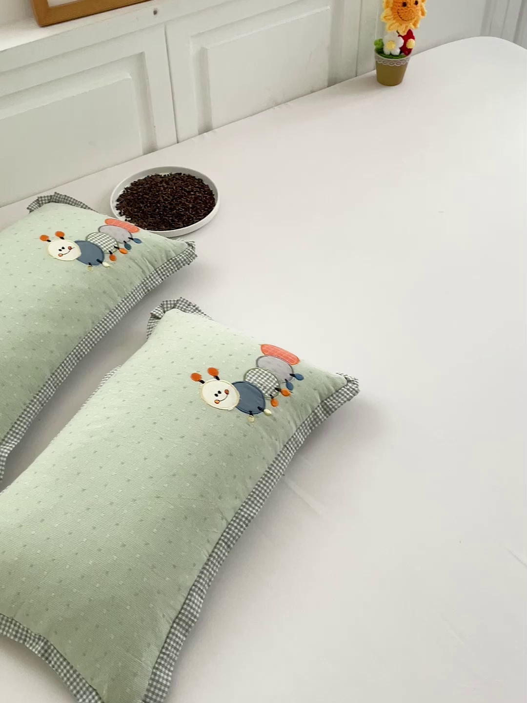 91家纺网 家纺一手货源 找家纺 梦叶草 2026新款全棉色织荞麦枕糖果虫荞麦枕枕头枕芯 糖果虫-绿色