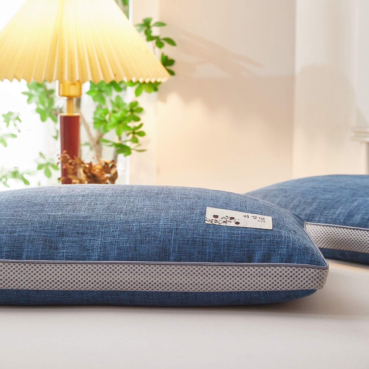 91家纺网 家纺一手货源 找家纺 梦叶草 2026新款棉麻贴布绣透气立体网荞麦枕  枕头枕芯 棉麻透气荞麦枕-蓝色