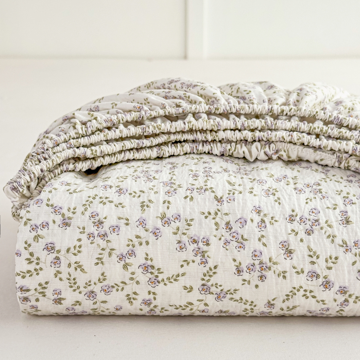 91家纺网 家纺一手货源 找家纺 优雅星家纺 2026春夏新款a类泡芙双层纱床笠印花卡通全包围床垫保护套单床笠 床笠单件 莫奈紫