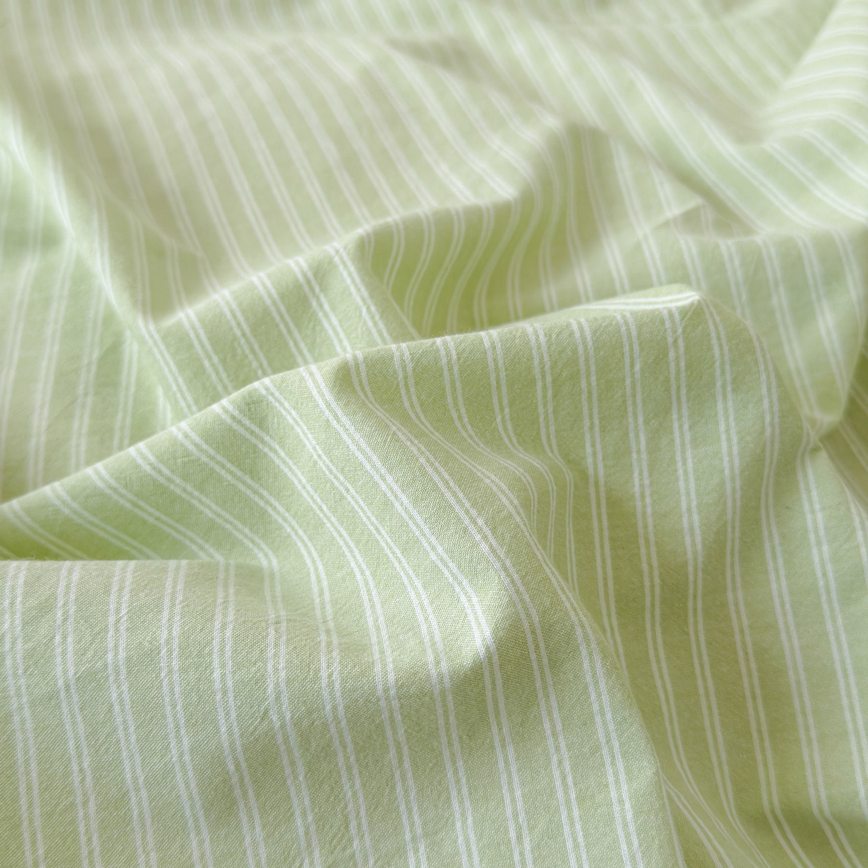 91家纺网 家纺一手货源 找家纺 玖弘家居 2026新款亲肤水洗棉四件套-糖果条(枕套默认混搭) 苹果绿条混搭