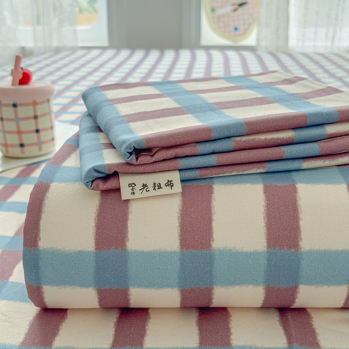 91家纺网 家纺一手货源 找家纺 慕梵家居 2026春夏新款全棉纯棉老粗布单床单 床单单件 格言-咖