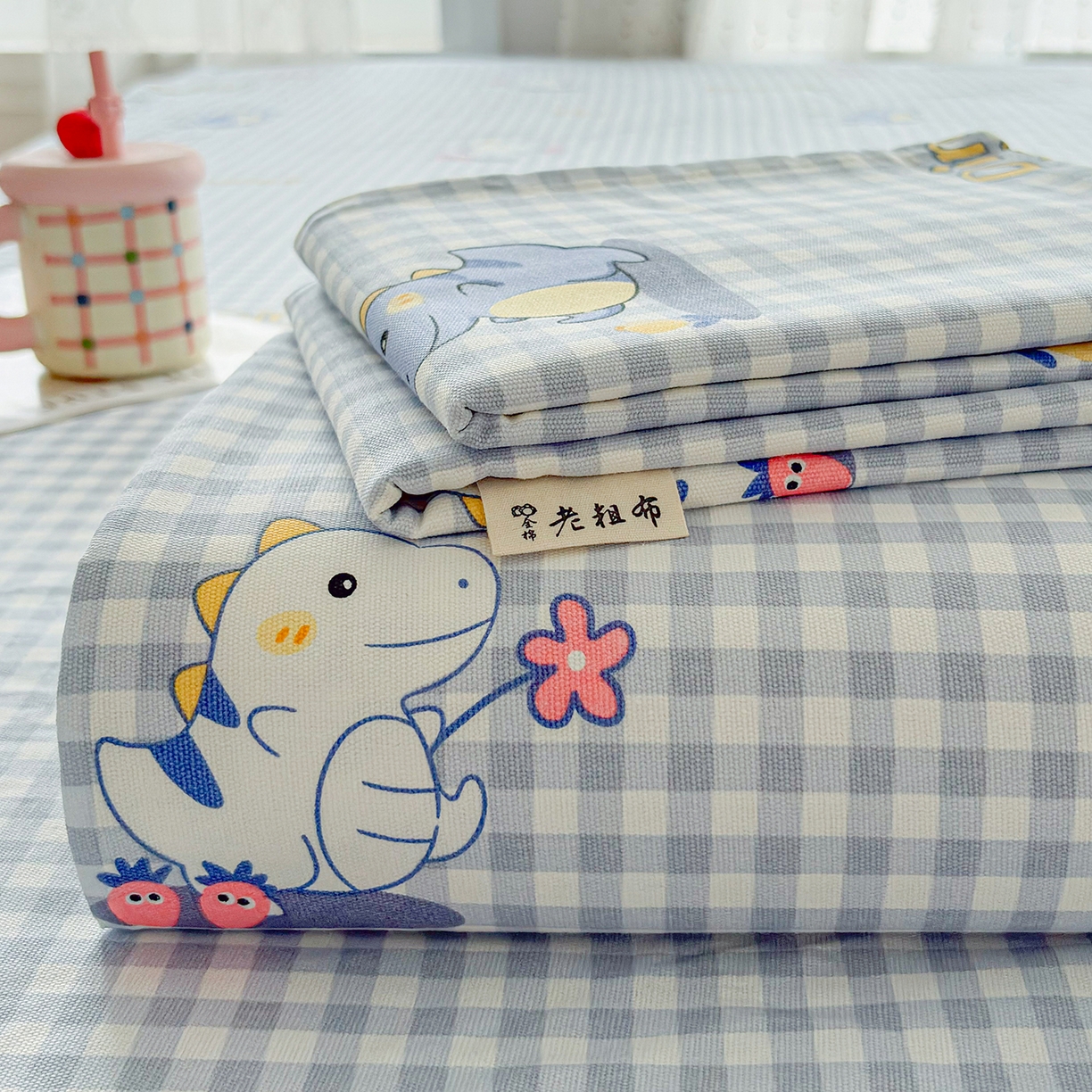 91家纺网 家纺一手货源 找家纺 慕梵家居 2026春夏新款全棉纯棉老粗布单床单 床单单件 小恐龙