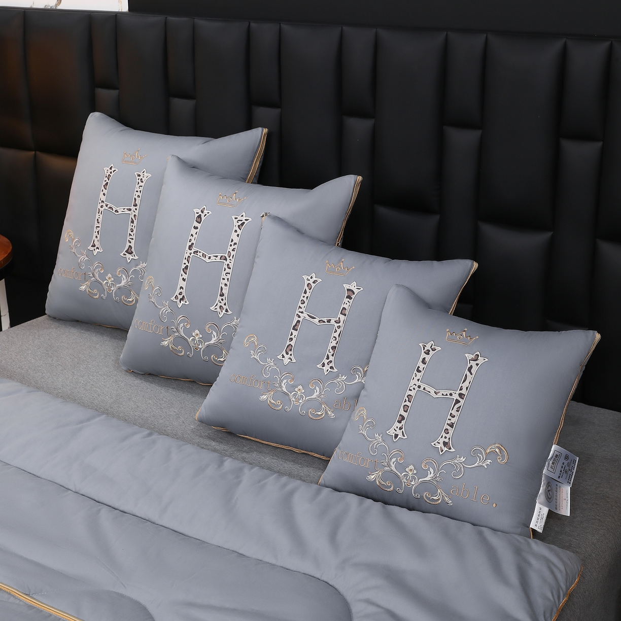 91家纺网 家纺一手货源 找家纺 照世家纺 2026新款全棉安逸H款抱枕被 浅灰