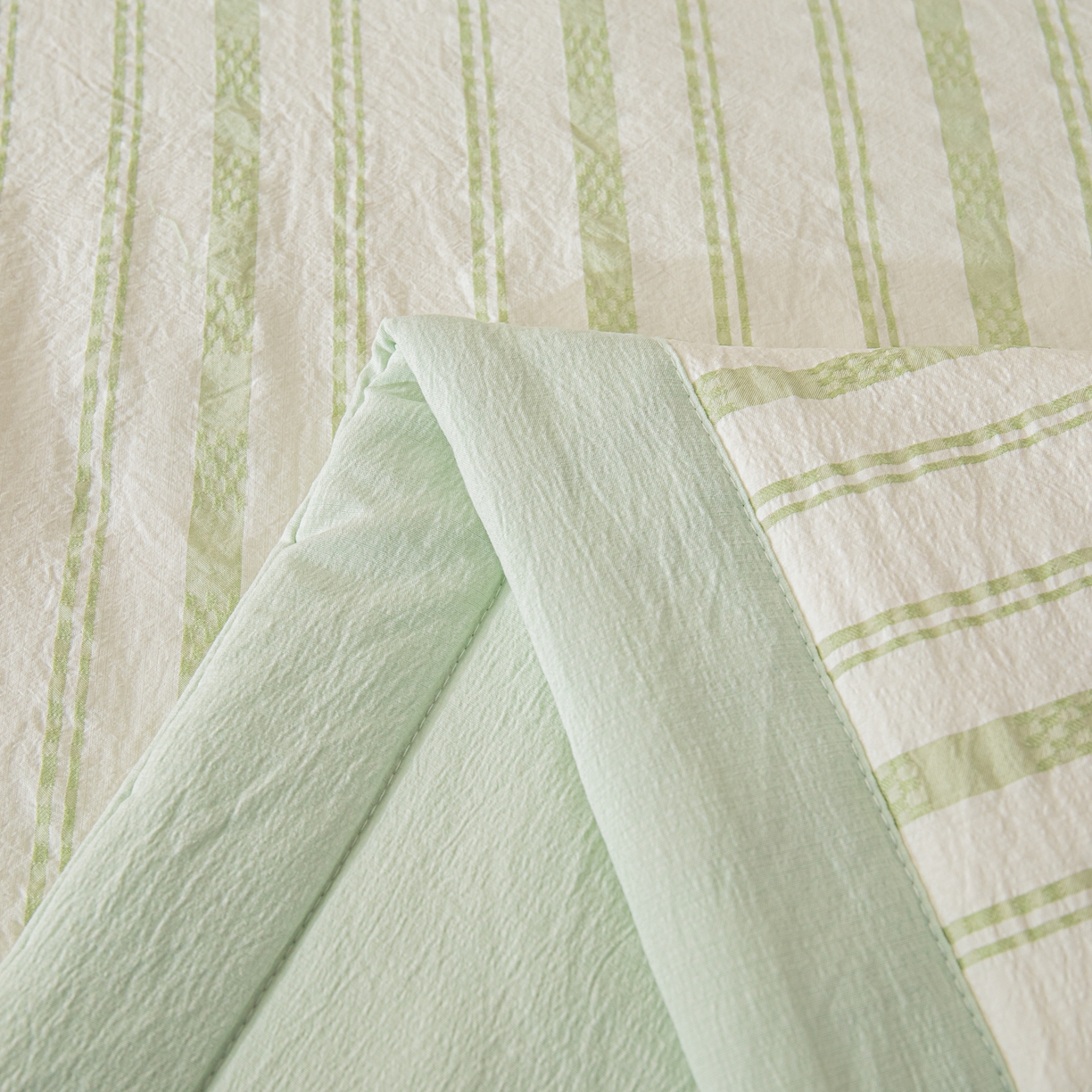 91家纺网 家纺一手货源 找家纺 江暮云家纺 2026新款色织提花新疆棉花夏被空调被 织韵-绿