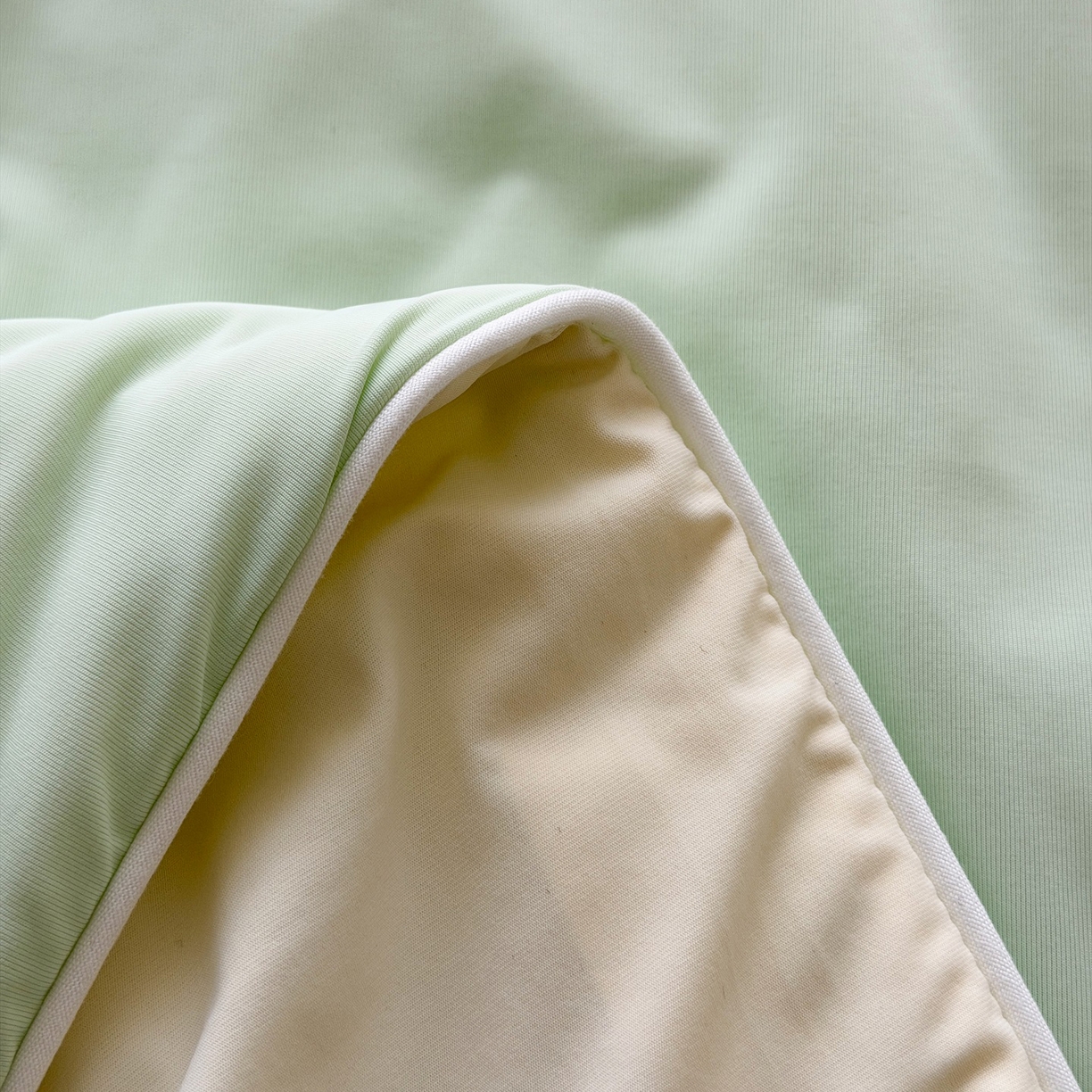 91家纺网 家纺一手货源 找家纺 朵希曼 2026新款锦氨纯色凉感夏被夏凉被空调被 发芽绿-奶白