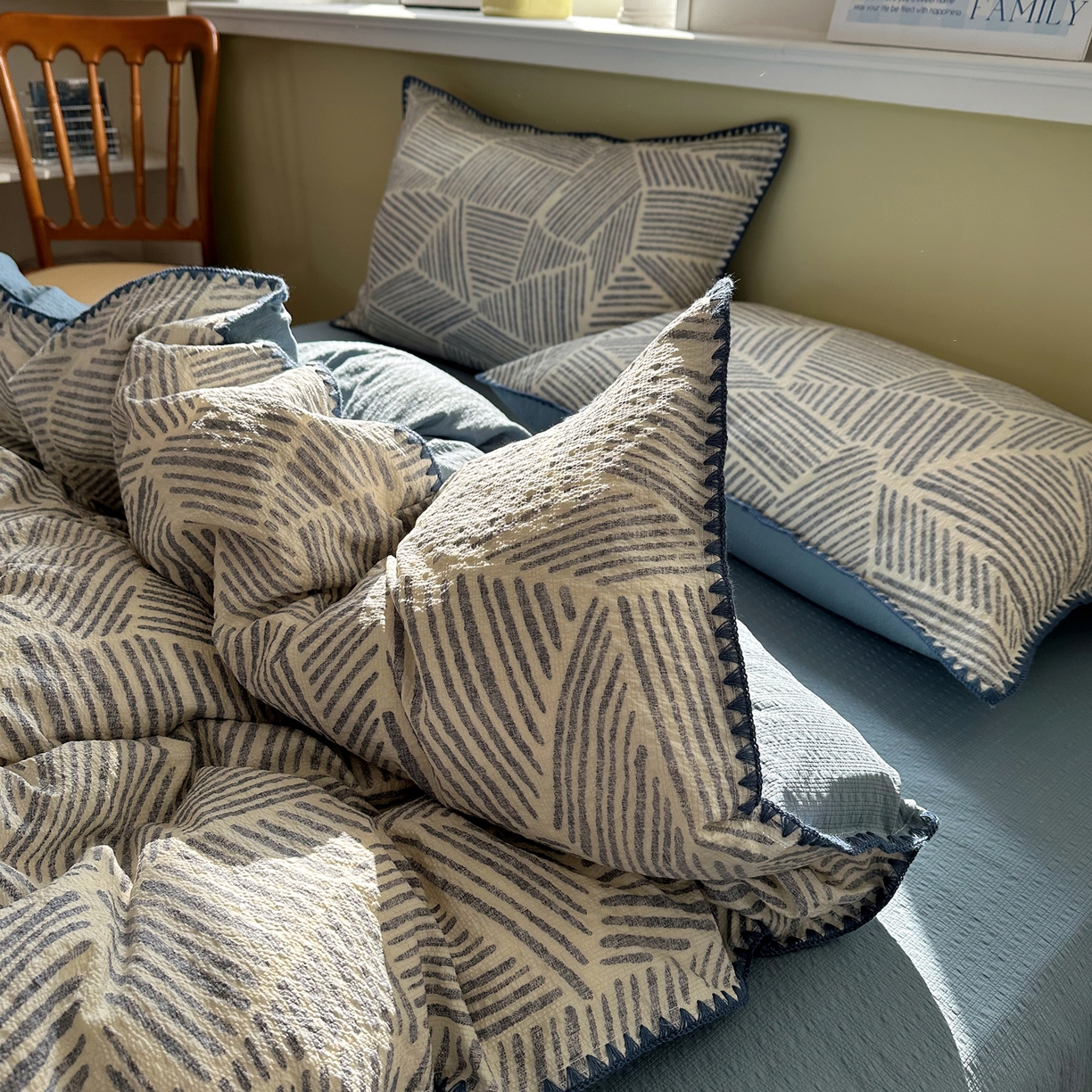 91家纺网 家纺一手货源 找家纺 几禾 2026新款高品质A类110g泡芙纱甜栗贝壳边四件套 甜栗-浅川纹