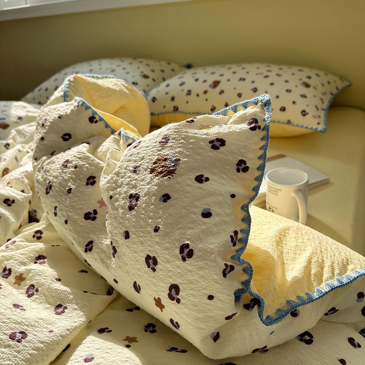 91家纺网 家纺一手货源 找家纺 几禾 2026新款高品质A类110g泡芙纱甜栗贝壳边四件套 甜栗-豹纹咪星黄