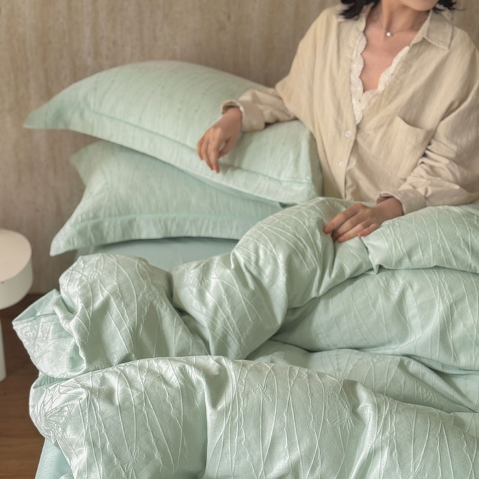 91家纺网 家纺一手货源 找家纺 奈萝家纺 2026新款长绒棉纯棉水洗全棉浮雕提花四件套 佩里水绿