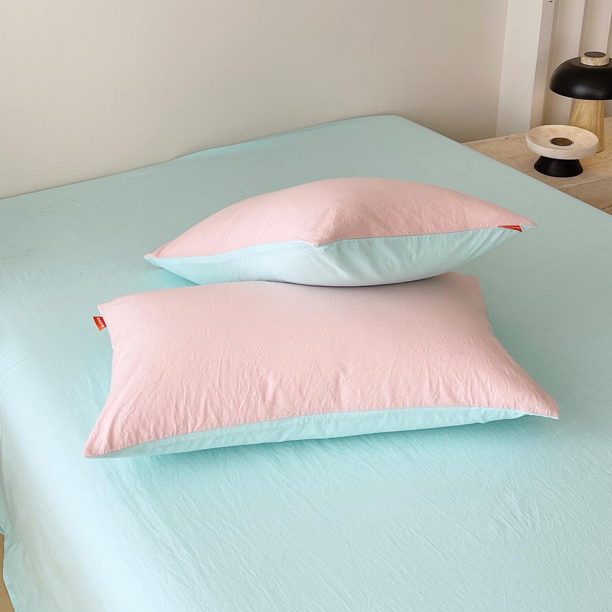 91家纺网 家纺一手货源 找家纺 春皖家纺 2026春夏新款双拼全棉水洗棉单枕套枕套单件单品枕套 樱花粉-翠兰