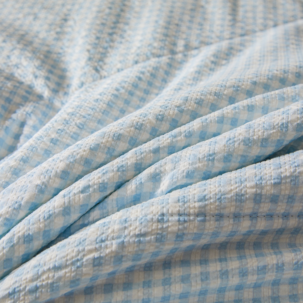 91家纺网 家纺一手货源 找家纺 熙宴家纺 2026新款云感泡芙棉花夏被四件套 蓝方格