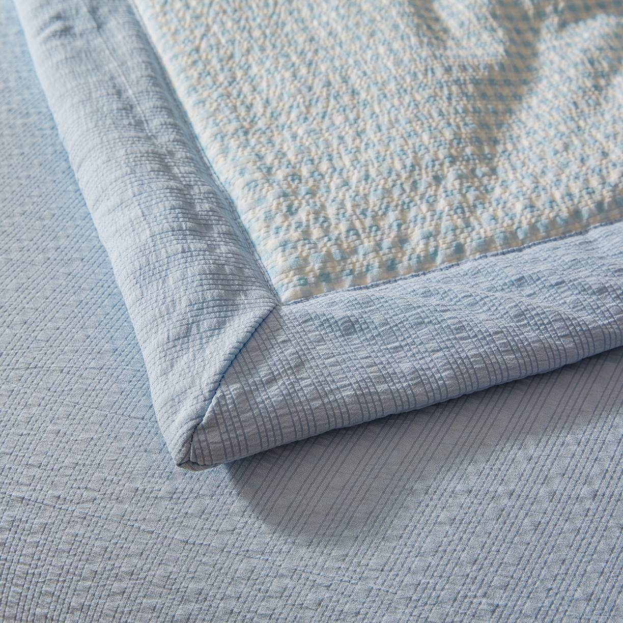 91家纺网 家纺一手货源 找家纺 熙宴家纺 2026新款云感泡芙棉花夏被四件套 蓝方格