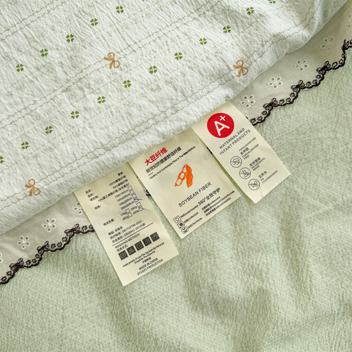 91家纺网 家纺一手货源 找家纺 招财星家纺 2026新款A类全棉花边云感双层纱大豆纤维夏被四件套夏被夏凉被空调被（带质检报告买家秀） 花边款-幸运结-绿