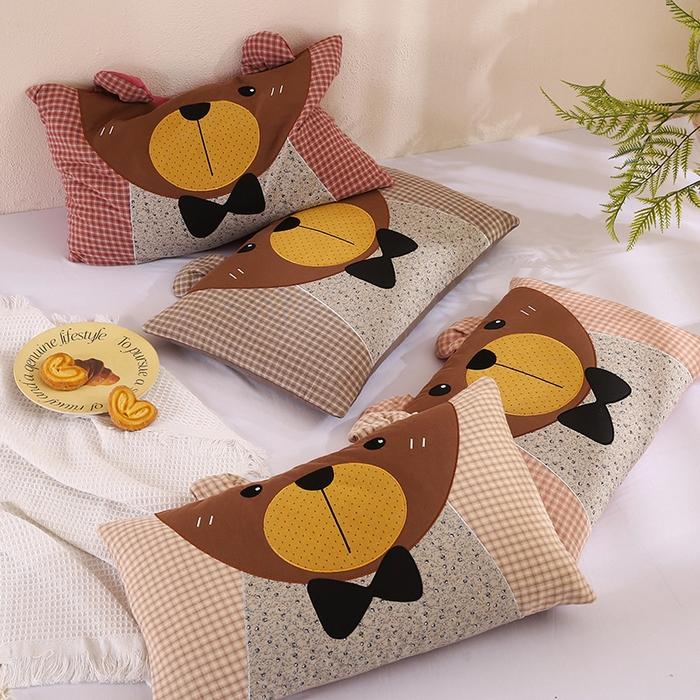 91家纺网 家纺一手货源 找家纺 蔻眠 萌熊-全棉刺绣卡通荞麦护颈枕头儿童学生荞麦枕芯 主图