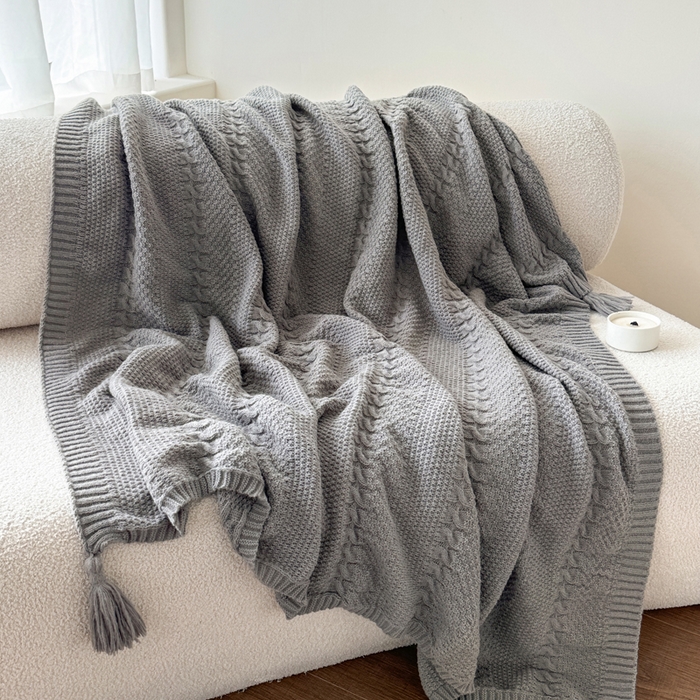 91家纺网 家纺一手货源 找家纺 丹本家纺 2026新款针织毛毯鹿毛绒纯色流苏航空休闲毯办公午睡盖毯多功能装饰毯 烟墨灰