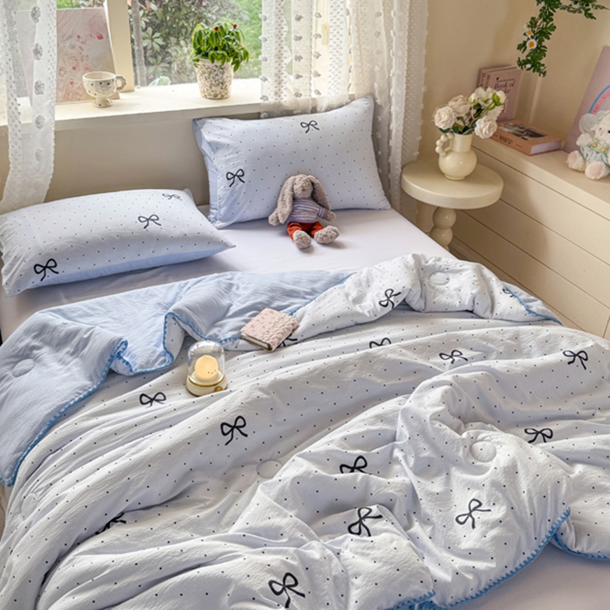 91家纺网 家纺一手货源 找家纺 雅蔓依家纺 2026春夏新款三角针贝壳边木棉云感双层纱棉花夏被夏凉被空调被 海盐蝴蝶结