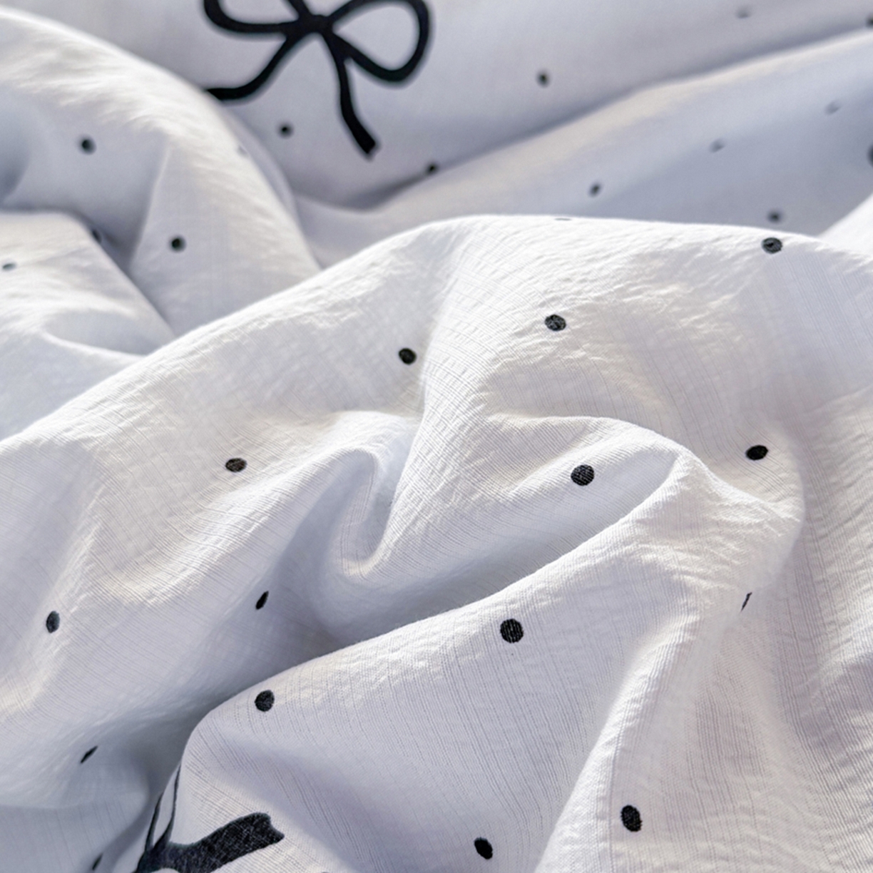 91家纺网 家纺一手货源 找家纺 雅蔓依家纺 2026春夏新款三角针贝壳边木棉云感双层纱棉花夏被夏凉被空调被 海盐蝴蝶结