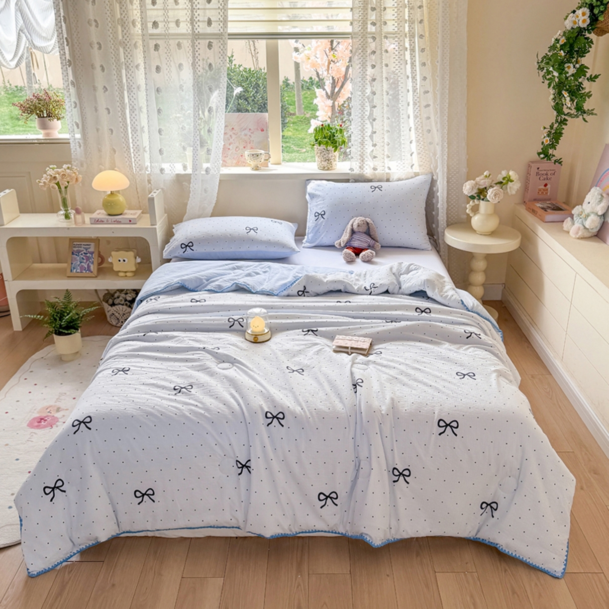 91家纺网 家纺一手货源 找家纺 雅蔓依家纺 2026春夏新款三角针贝壳边木棉云感双层纱棉花夏被夏凉被空调被 海盐蝴蝶结