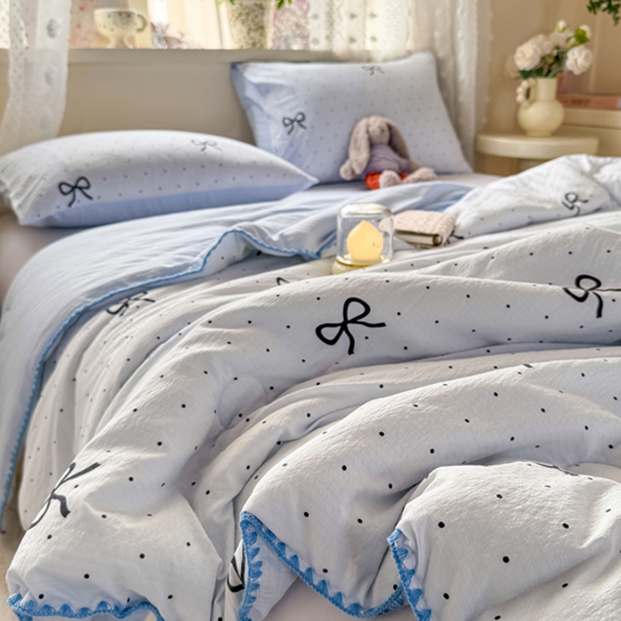 91家纺网 家纺一手货源 找家纺 雅蔓依家纺 2026春夏新款三角针贝壳边木棉云感双层纱棉花夏被夏凉被空调被 海盐蝴蝶结