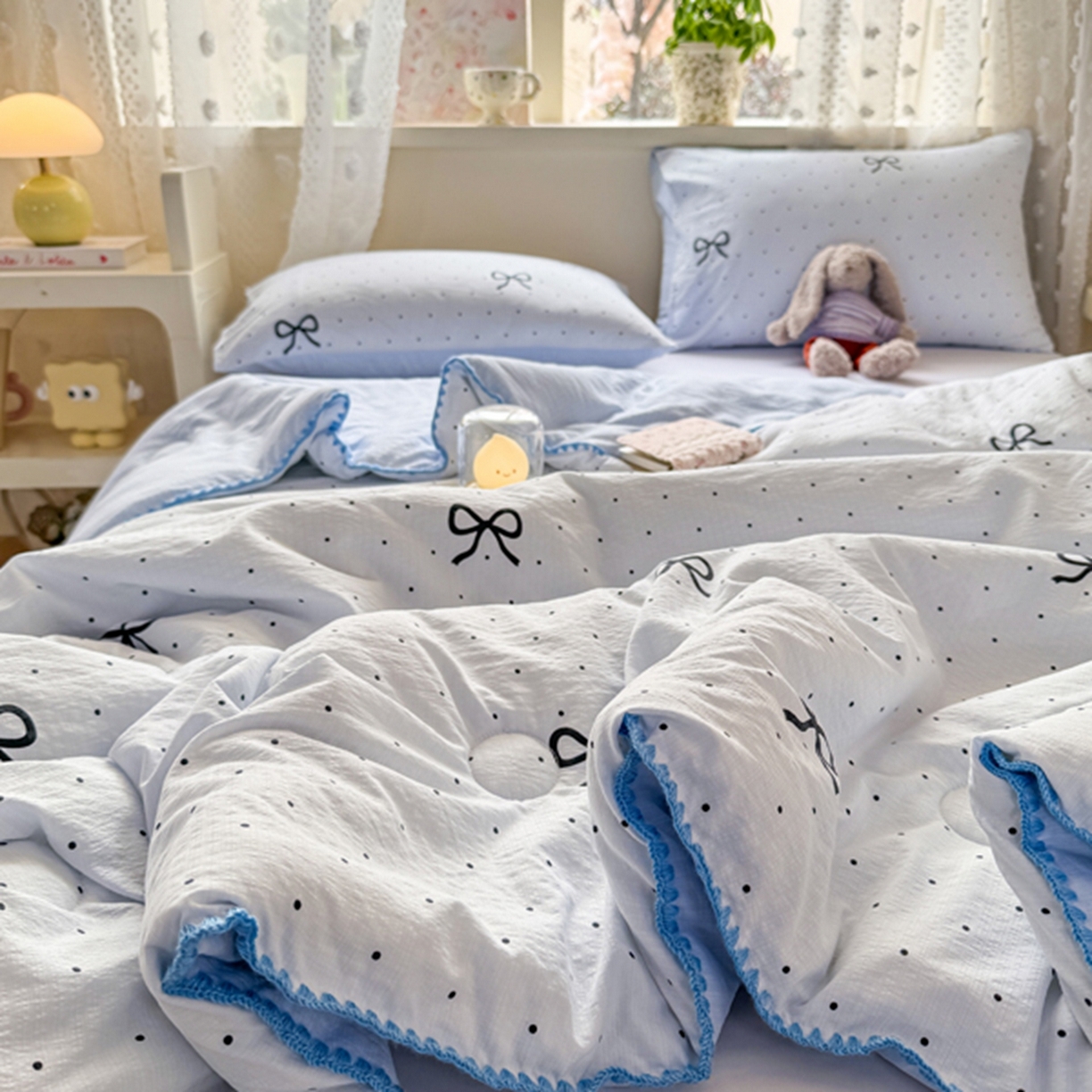 91家纺网 家纺一手货源 找家纺 雅蔓依家纺 2026春夏新款三角针贝壳边木棉云感双层纱棉花夏被夏凉被空调被 海盐蝴蝶结